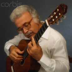 1985-1990, Paris, France --- Egyptian-born French guitarist of Italian and Greek origins Alexandre Lagoya. --- Image by © Jacques Sarrat/Sygma/Corbis